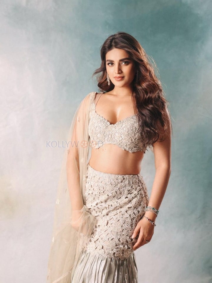 Dazzling Nidhhi Agerwal in a Sterling Silver Floral Cutwork Lehenga Photos 02
