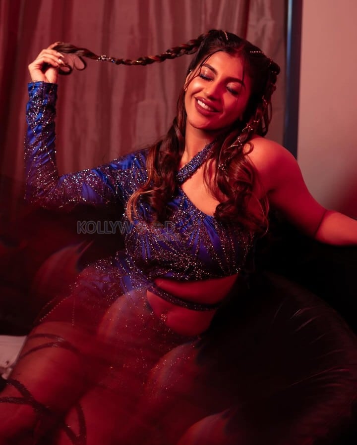 Dazzling Yashika Aannand in a Blue Shimmery Mini Dress Photos 03