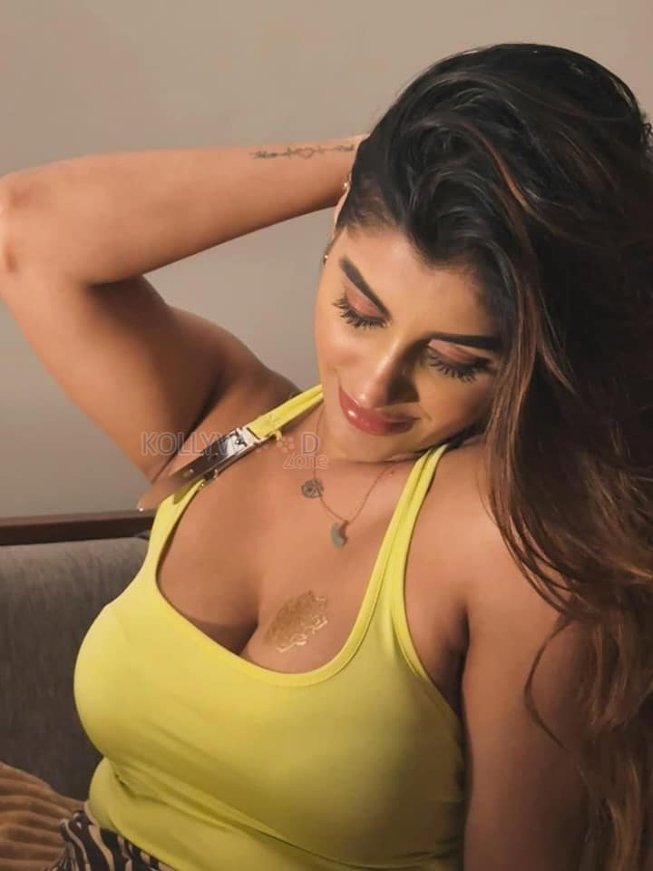 Devils Double Next Level Actress Yashika Aannand in a Lime Green Halter Neck Top Pictures 04