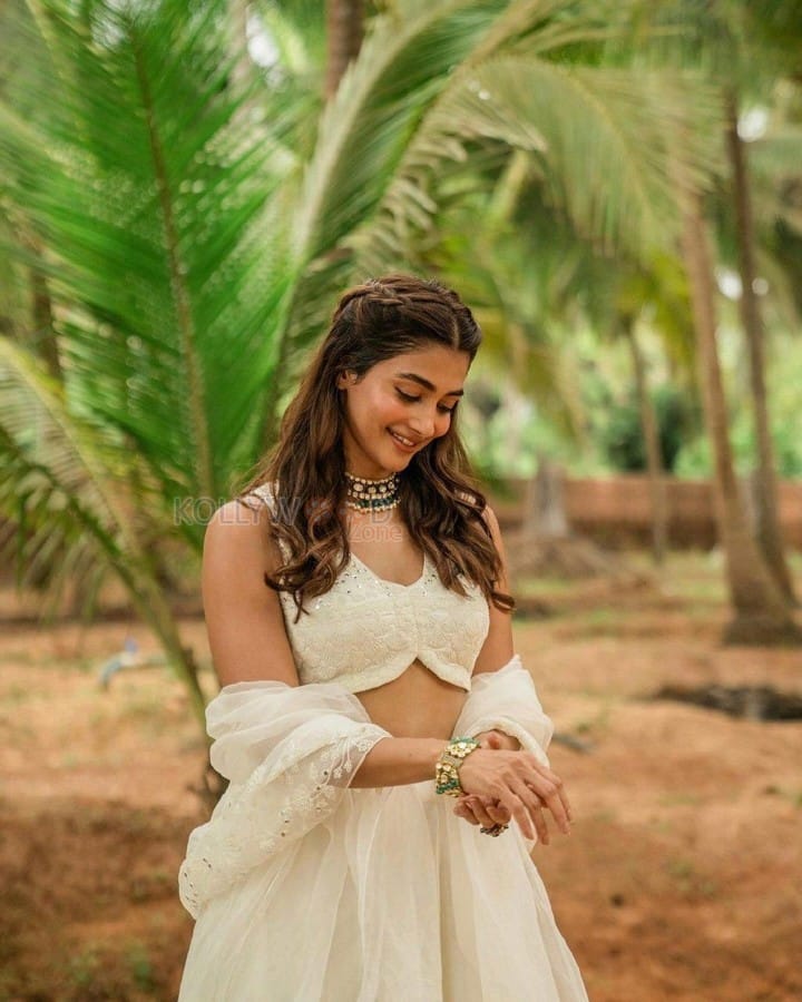 Dreamy Pooja Hegde in a Ivory Chanderi Silk Lehenga Photos 01