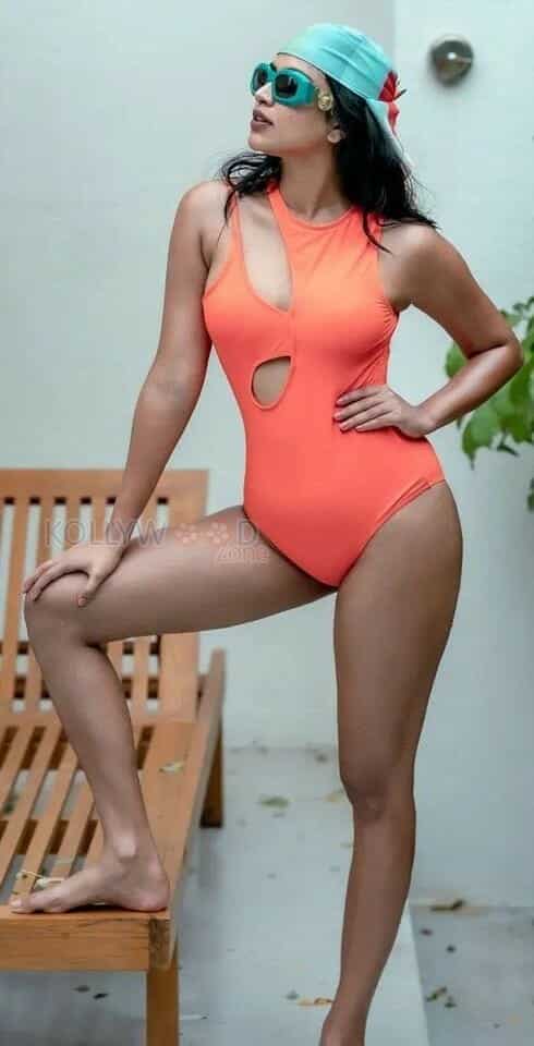 Dusky Beauty Amala Paul Orange Swimsuit Photos 01