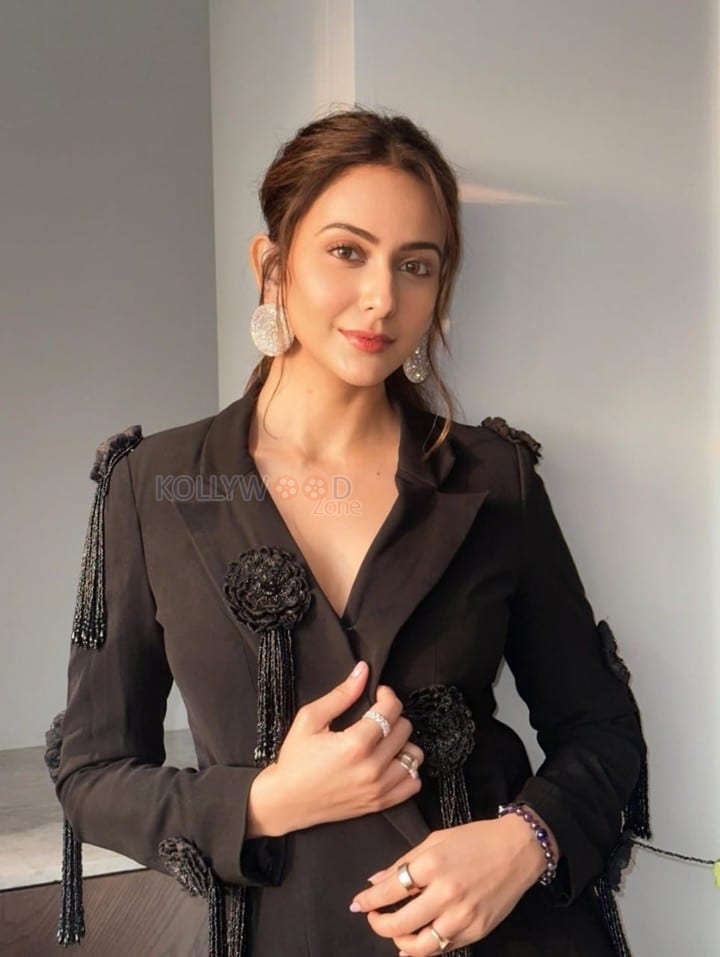 Elegant Rakul Preet Singh in a Black Long Sleeved Top with a Sheer Black Maxi Skirt Pictures 01
