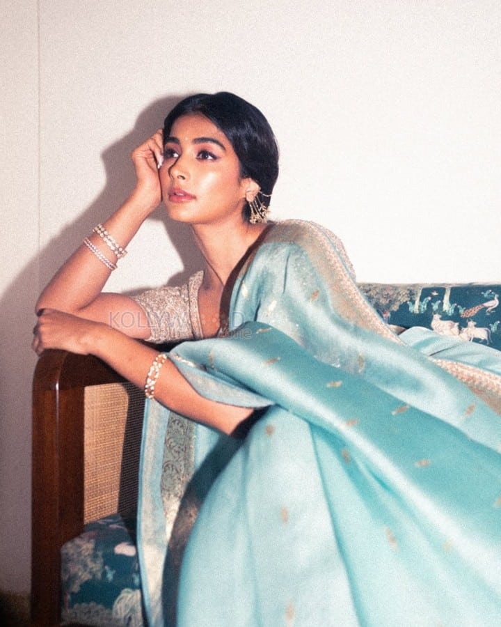 Elegant Vintage Beauty Pooja Hegde in a Sky Blue Paithani Saree Photos 05