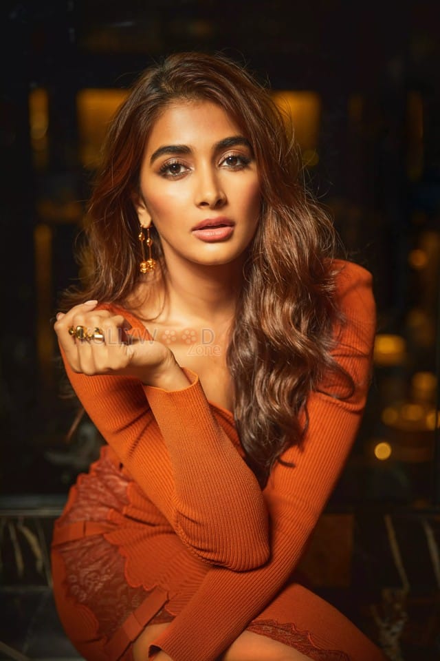 Enchanting Pooja Hegde in an Orange Ribbed Thigh Slit Dress Pictures 03