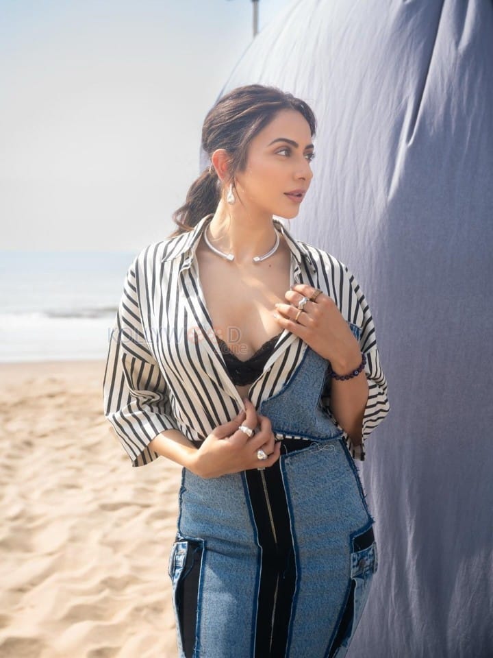 Fashionable Rakul Preet Singh in a Black and White Striped Denim Shirt with a Black Bralette and Fitted Pencil Skirt Pictures 06