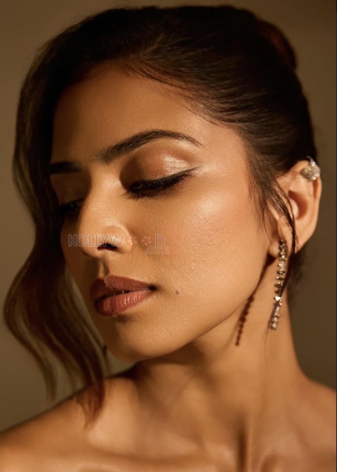 Glam Malavika Mohanan in a Golden Corset Top with a Black Slit Skirt Photos 03
