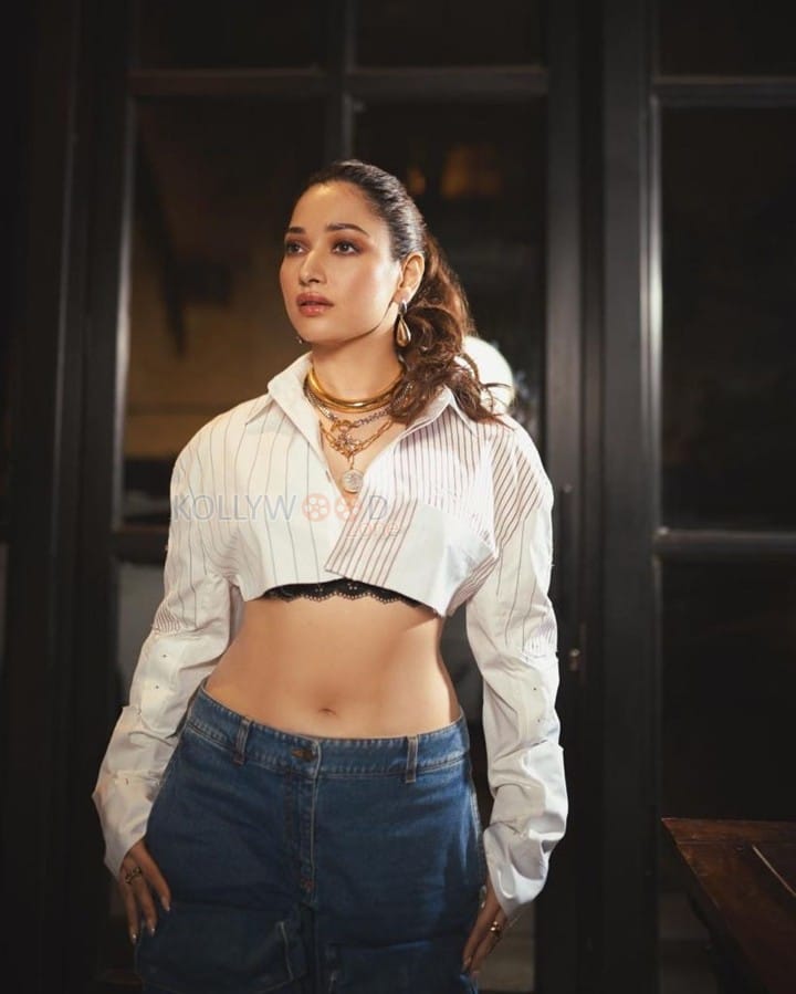 Glam Tamannaah Bhatia in a Casual Off White Cropped Shirt with Black Bra and Blue Denim Jeans Pictures 06