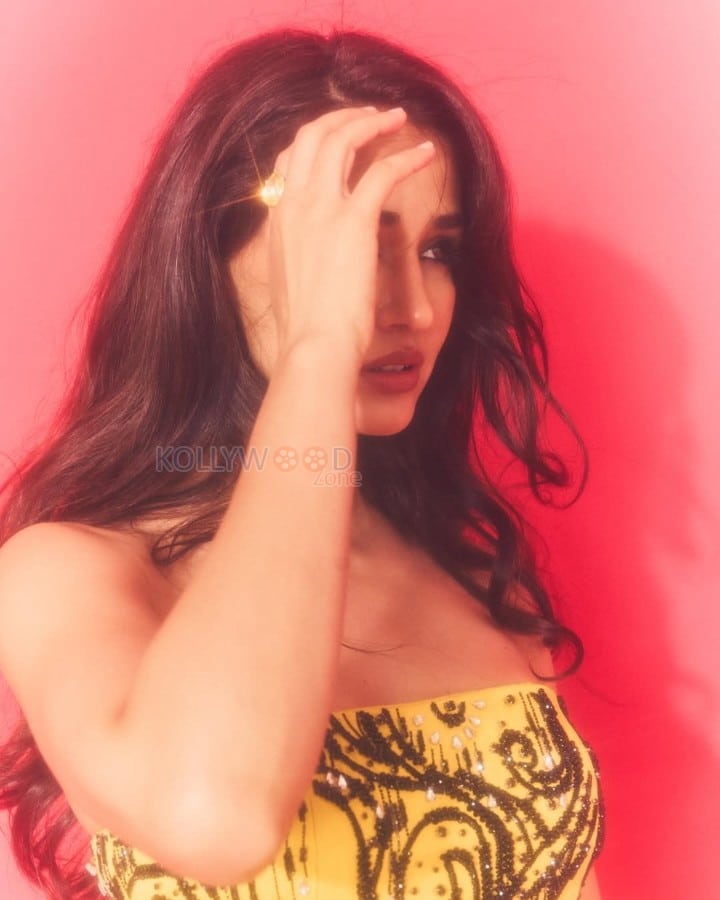 Glamorous Diva Disha Patani in a Strapless Yellow Mini Dress Photos 07
