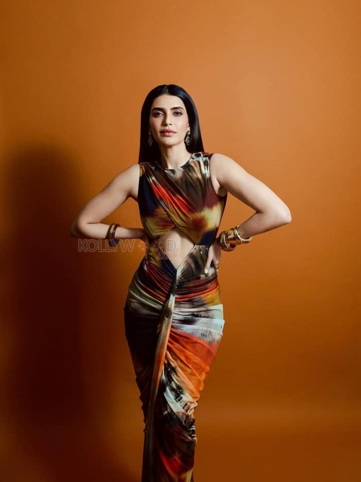 Gorgeous Karishma Tanna in a Stylish Sleeveless Floor Length Bodycon with a Front Cut Out Dress Photos 01