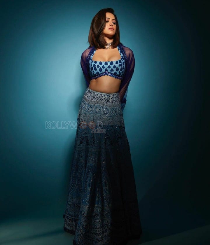 Gorgeous Nushrratt Bharuccha in a Low Neck Blue Lehenga with a Sleeveless Blouse Photos 03
