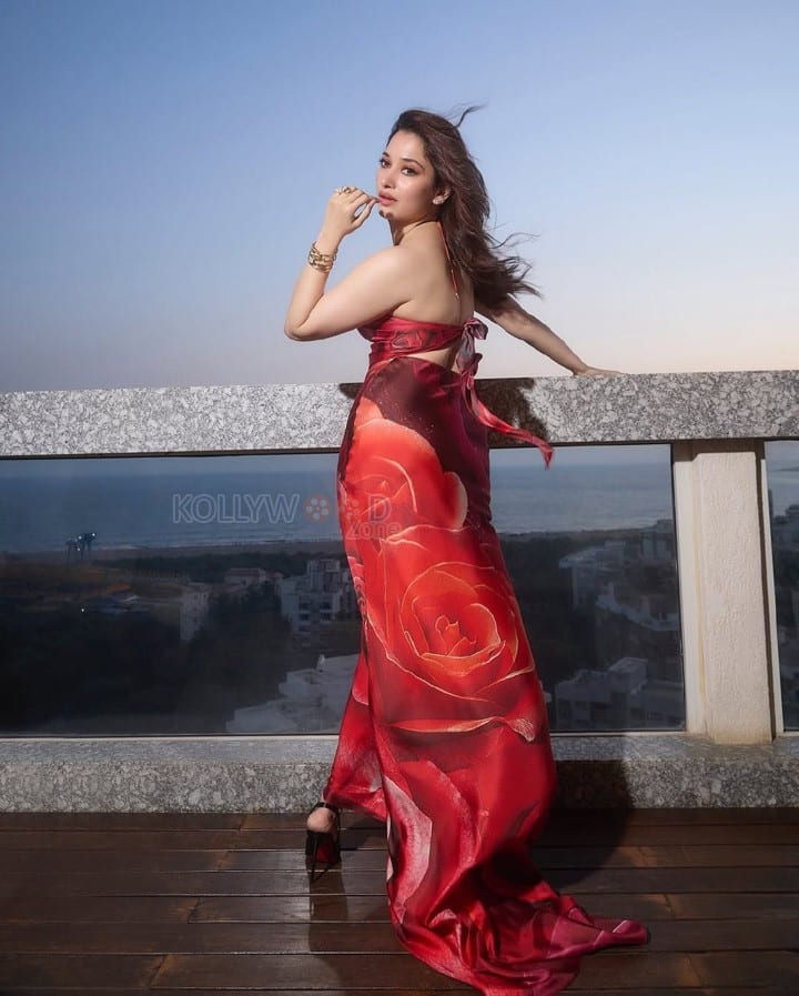 Gorgeous Tamannaah Bhatia in a Cavalli Red Halter Neck Rose Printed Dress Photos 03