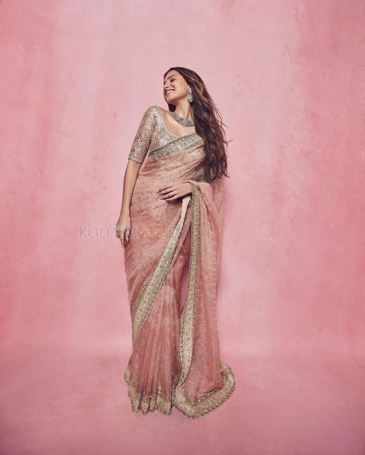 Gorgeous Tara Sutaria in a Peach Pink Embroidered Saree with Embellished Blouse Photos 04