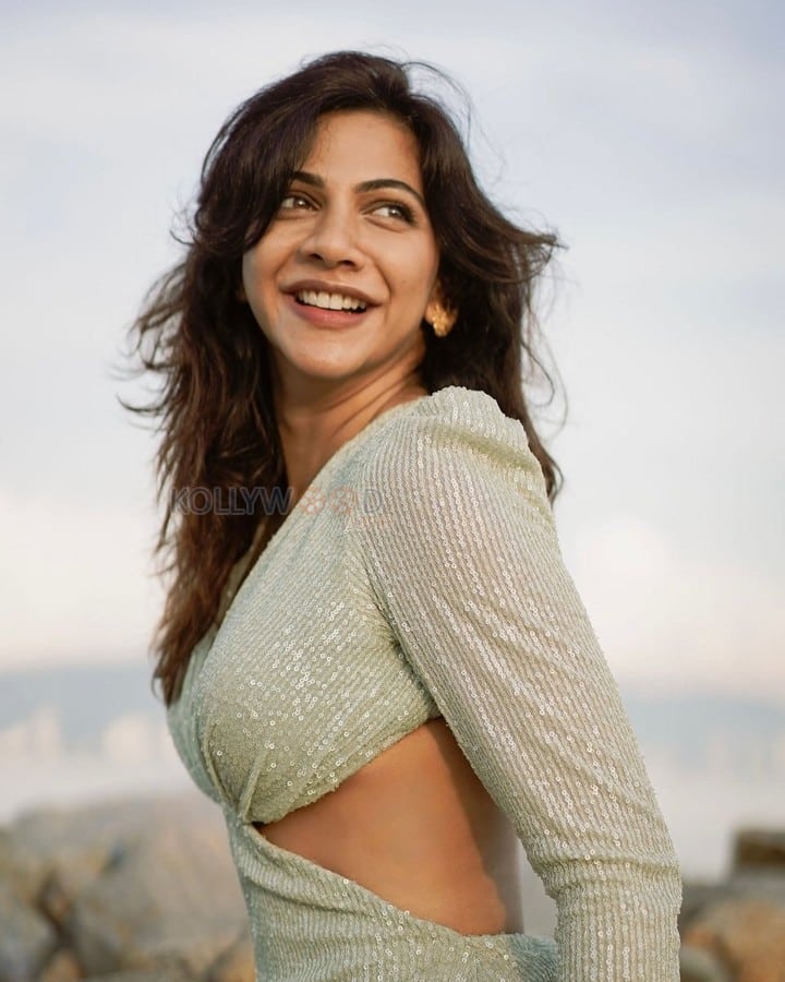 Graceful Beauty Madonna Sebastian in a Metallic V Neck Dress with Long Sleeves Pictures 02