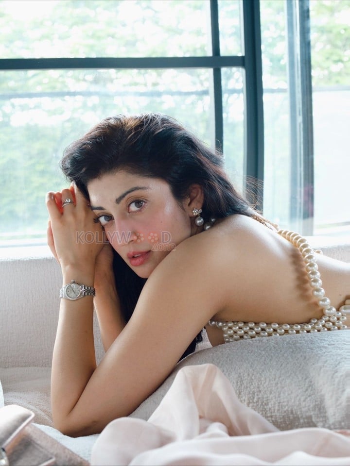 Graceful Pranitha Subhash in a Pastel Dress with Pearls Photos 01