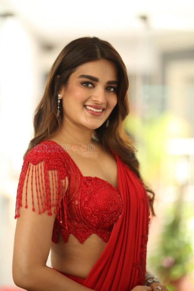Hari Hara Veera Mallu Part 1 Heroine Nidhhi Agerwal in a Red Saree Photos 03