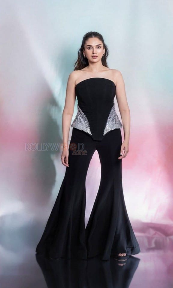 Heeramandi Actress Aditi Rao Hydari in a Black Corset Peplum Top with a Flared Trousers Photos 06