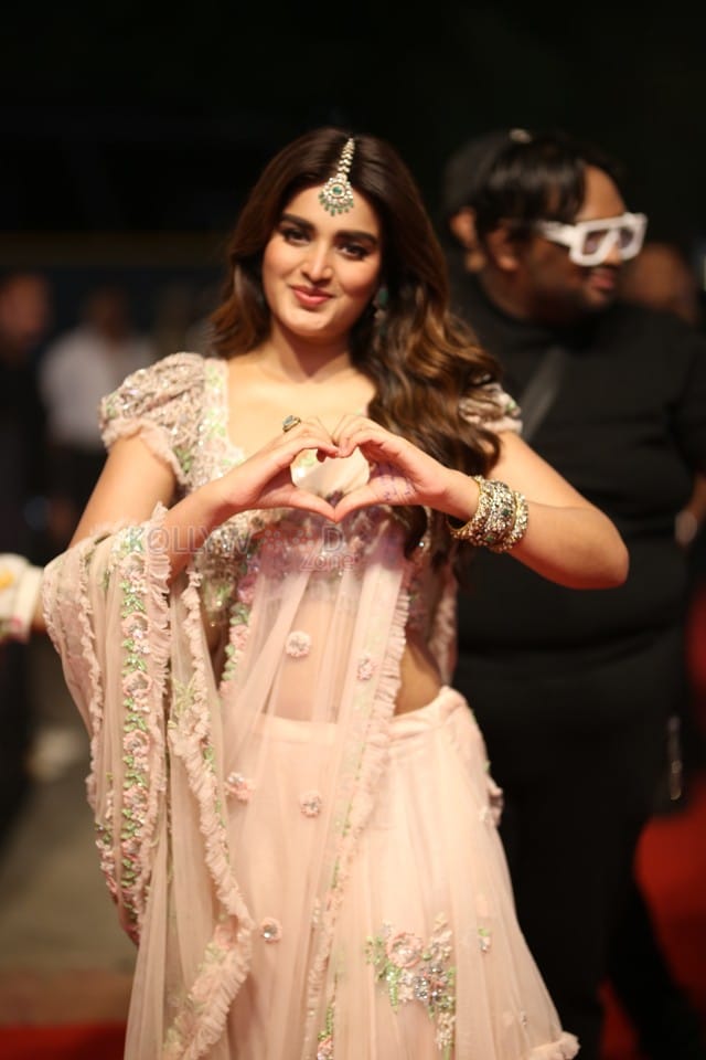 Heroine Nidhhi Agerwal at Hari Hara Veera Mallu Pre Release Event Pictures 20