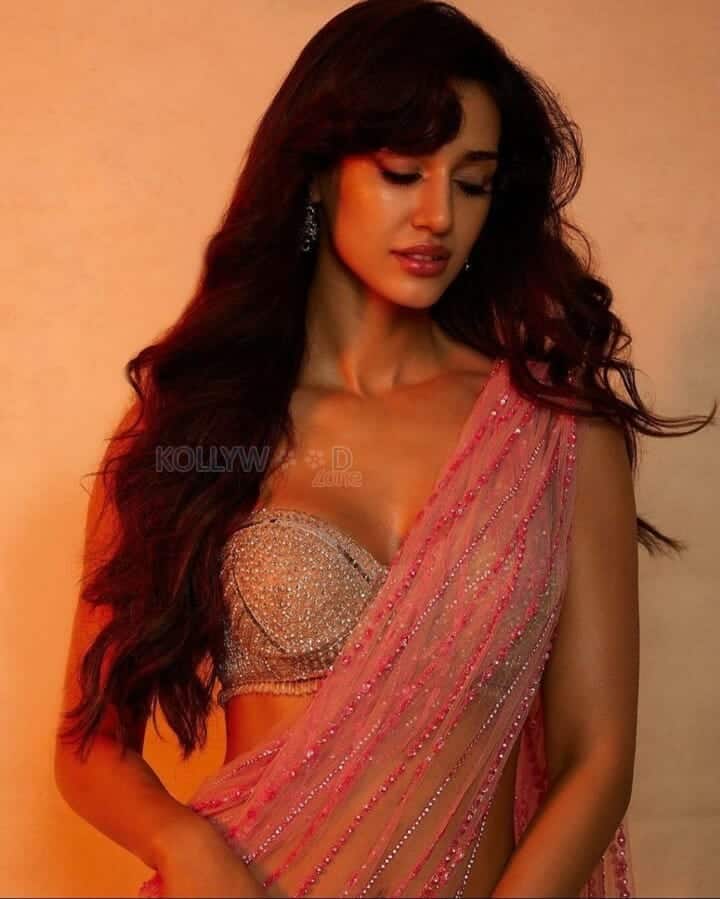 Hot Actress Disha Patani in a Sexy Transparent Saree Photoshoot Pictures 01