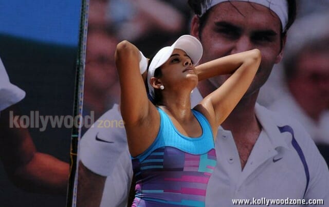 Hot Cleavage Pictures Of Priyamani Playing Tennis