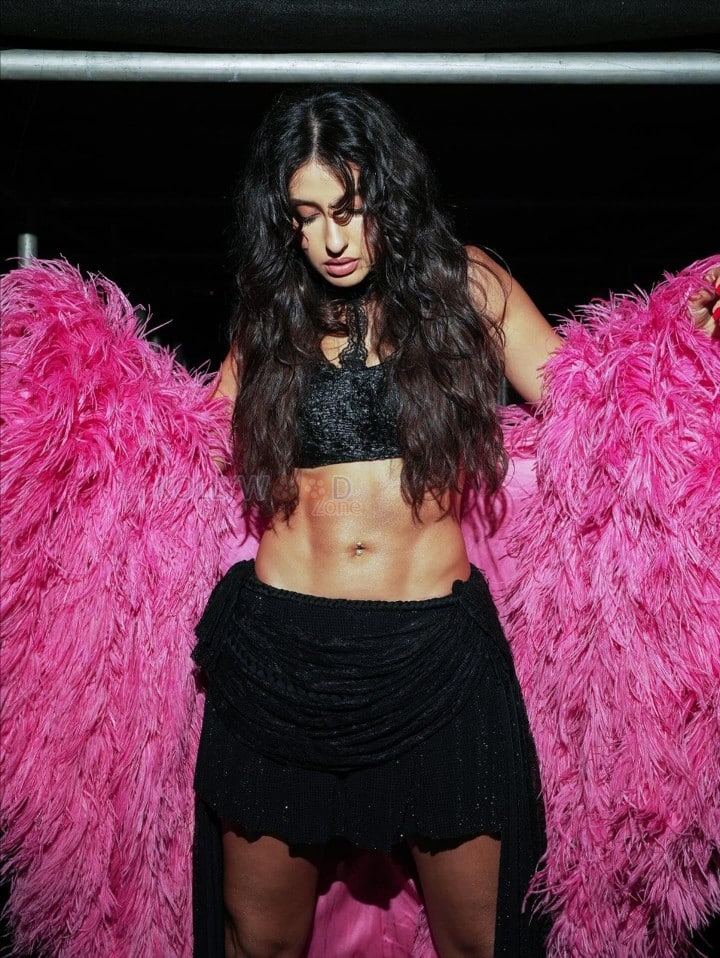Hot Dancer Model Nora Fatehi in a Black Sequined Crop Top and Mini Skirt with a Vibrant Pink Feather Jacket Pictures 04