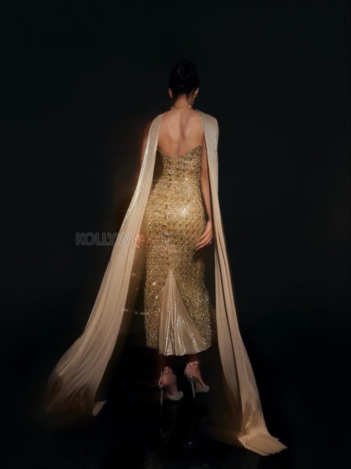 Hot Disha Patani in a Soft Gold Strapless Bodycon Gown Photos 02