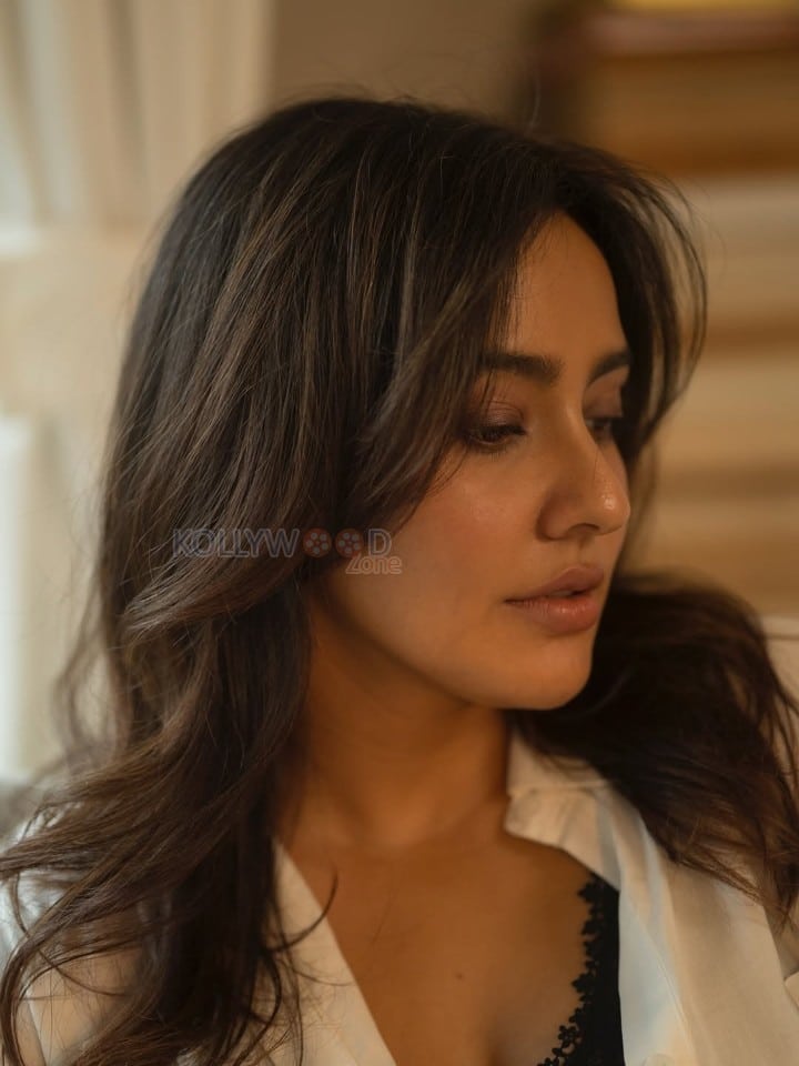 Hot Neha Sharma in a Black Lace Bra and Oversized White Shirt Photos 03