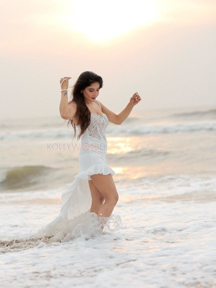 Hot Sakshi Agarwal in a White Sleeveless Lace Maxi Dress Pictures 06
