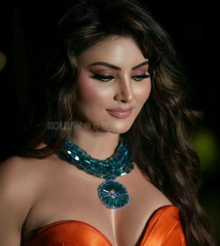 Hot Urvashi Rautela in a Sleeveless Orange Dress Pictures 01