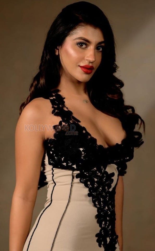 Hot Yashika Aannand Breast Cleavage in a Backless Floral Deep V Suspender Dress Photo 01