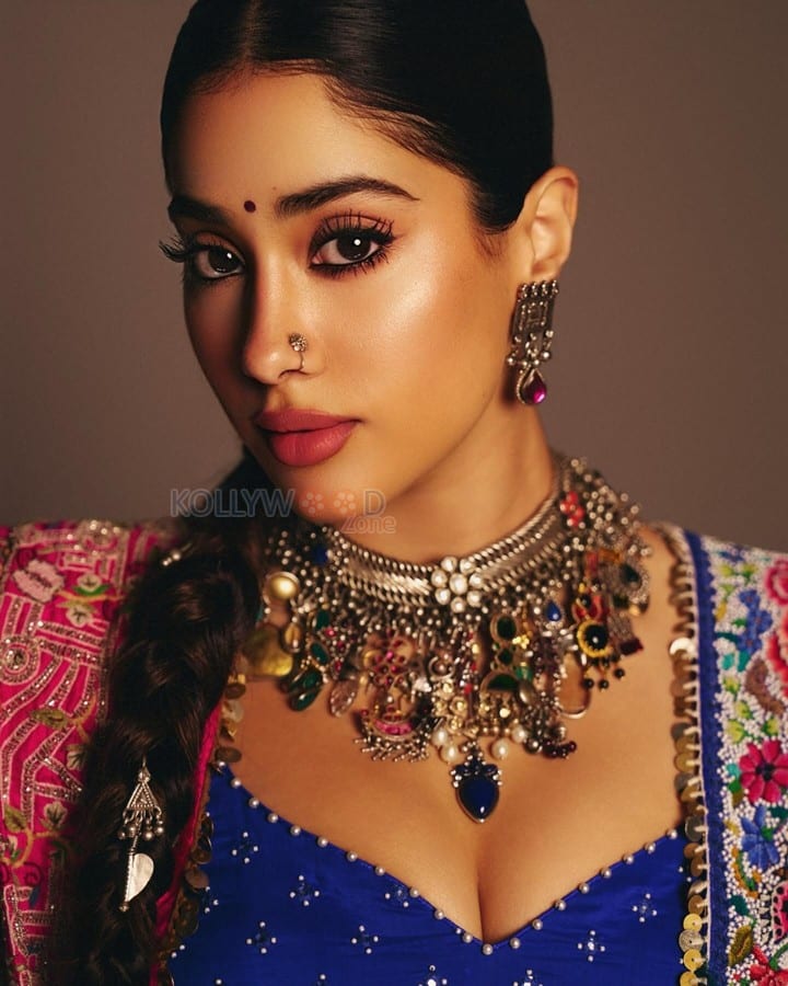 Indian Bollywood Actress Janhvi Kapoor in a Royal Blue and Hot Pink Designer Lehenga with a Blue Bustier Top Photos 01