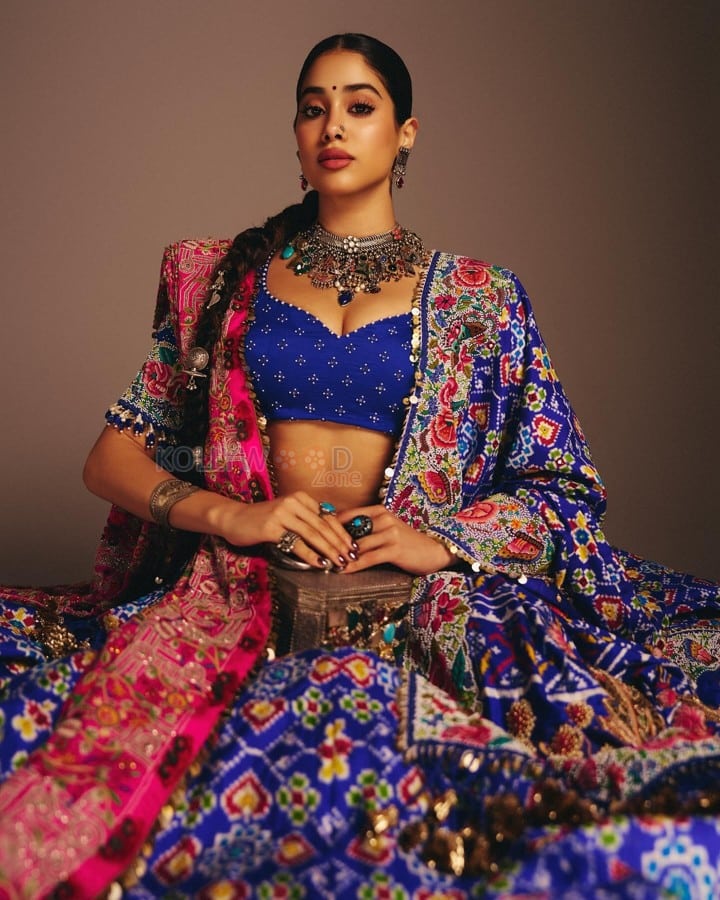Indian Bollywood Actress Janhvi Kapoor in a Royal Blue and Hot Pink Designer Lehenga with a Blue Bustier Top Photos 02