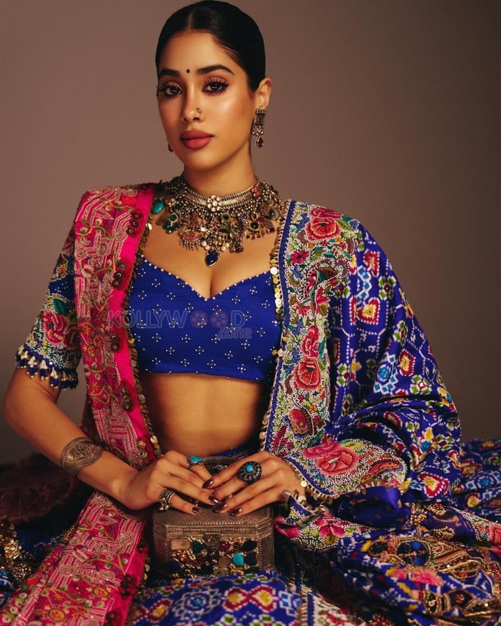 Indian Bollywood Actress Janhvi Kapoor in a Royal Blue and Hot Pink Designer Lehenga with a Blue Bustier Top Photos 03