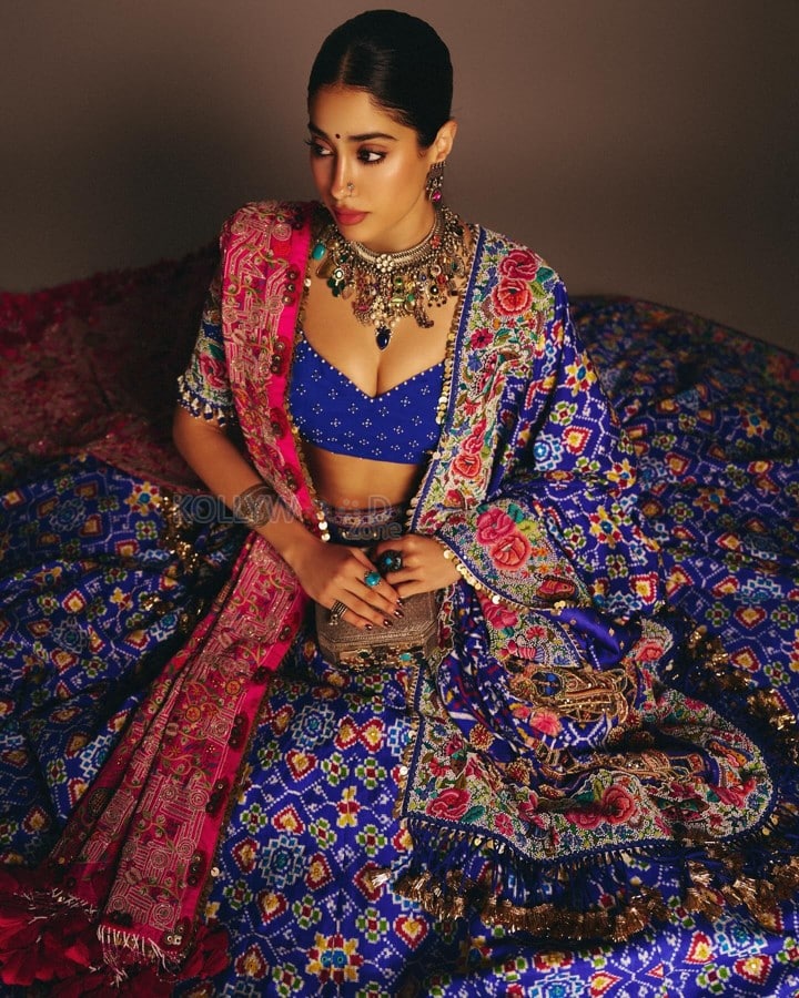 Indian Bollywood Actress Janhvi Kapoor in a Royal Blue and Hot Pink Designer Lehenga with a Blue Bustier Top Photos 06