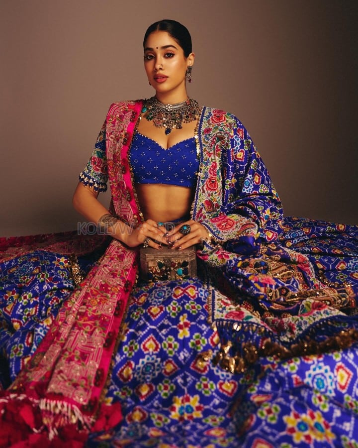 Indian Bollywood Actress Janhvi Kapoor in a Royal Blue and Hot Pink Designer Lehenga with a Blue Bustier Top Photos 08