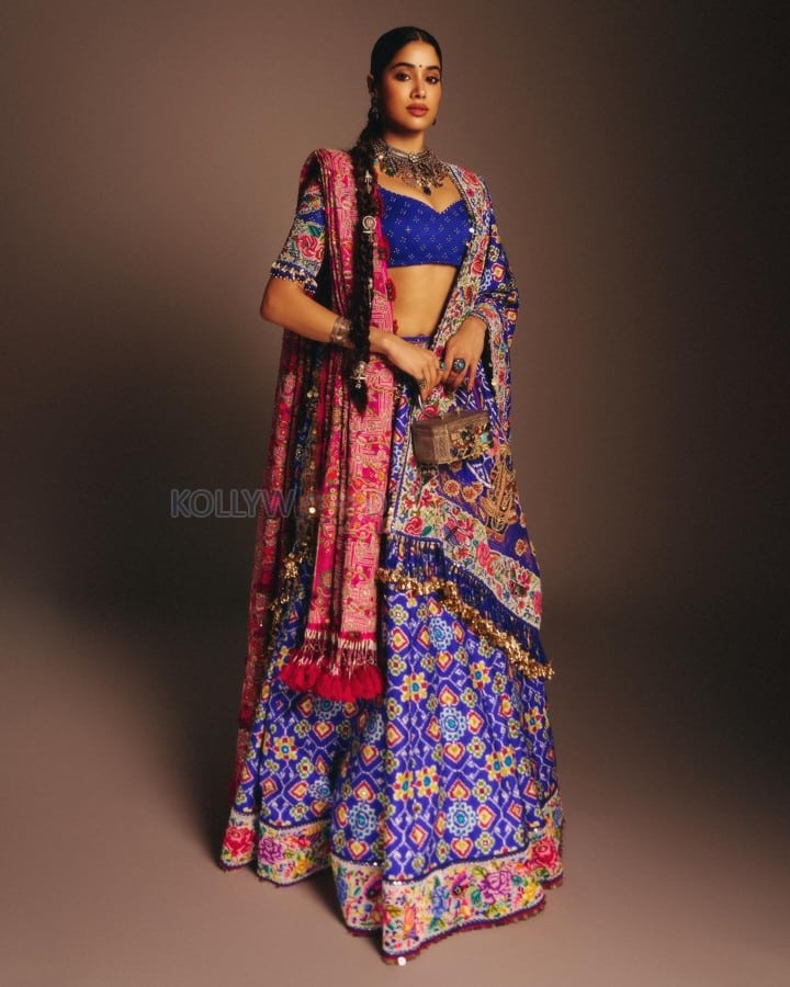 Indian Bollywood Actress Janhvi Kapoor in a Royal Blue and Hot Pink Designer Lehenga with a Blue Bustier Top Photos 09