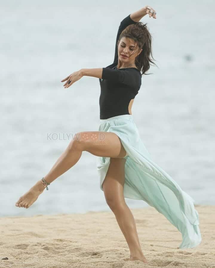 Jacqueline Fernandez Dancing Near the Beach Photo 01