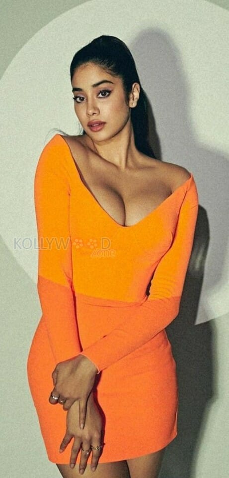 Janhvi Kapoor Showing Big Cleavage in a Orange Dress Photos 01