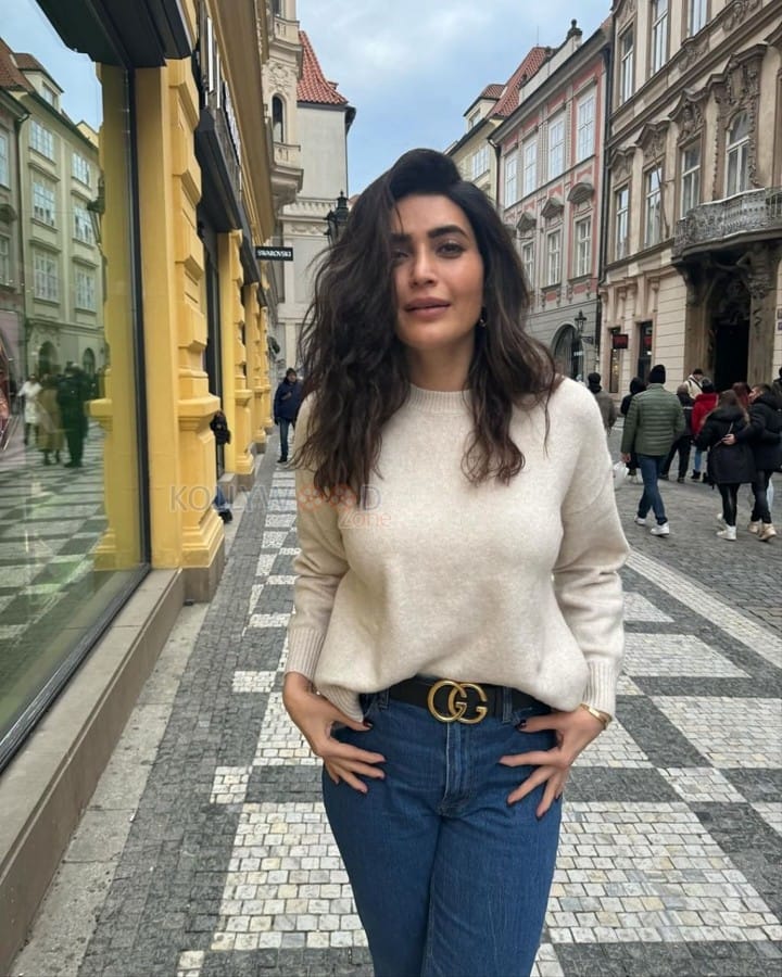 Karishma Tanna in a Light Beige Sweater and Blue Denim Photos 01