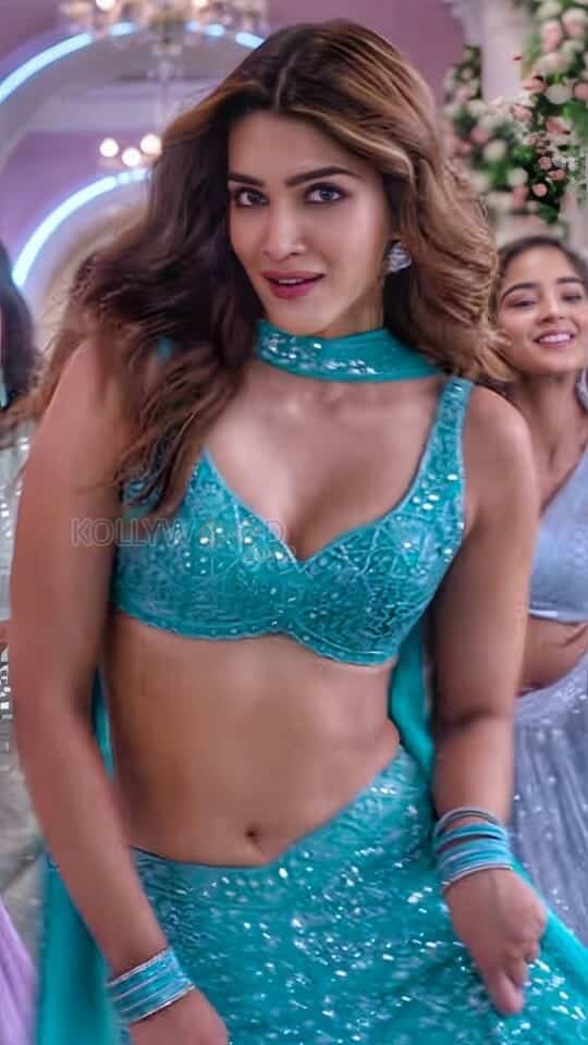 Kriti Sanon Showing Cleavage in a Song and Dance Routine Photos 02