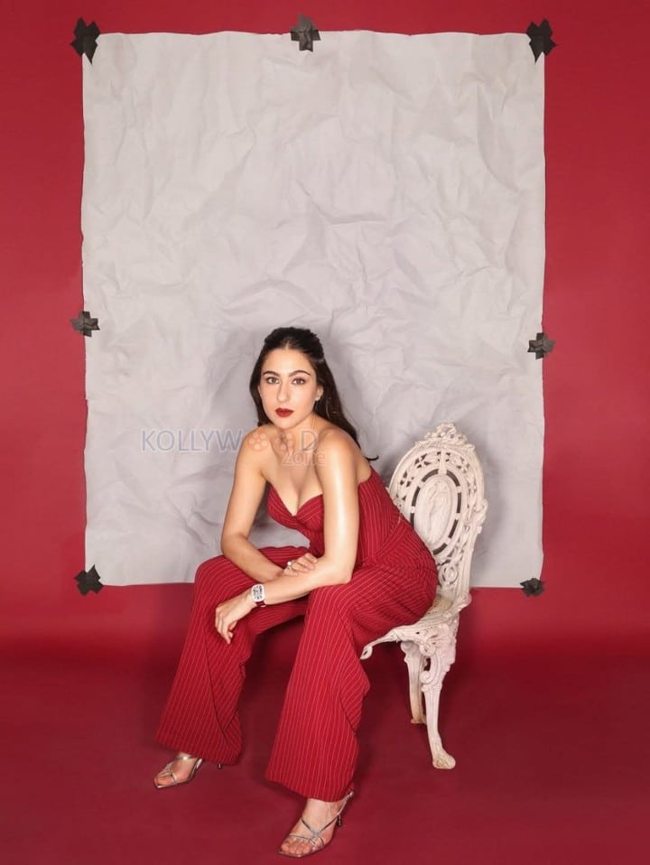 Luscious Sara Ali Khan in a Red Off Shoulder Jumpsuit Photos 01