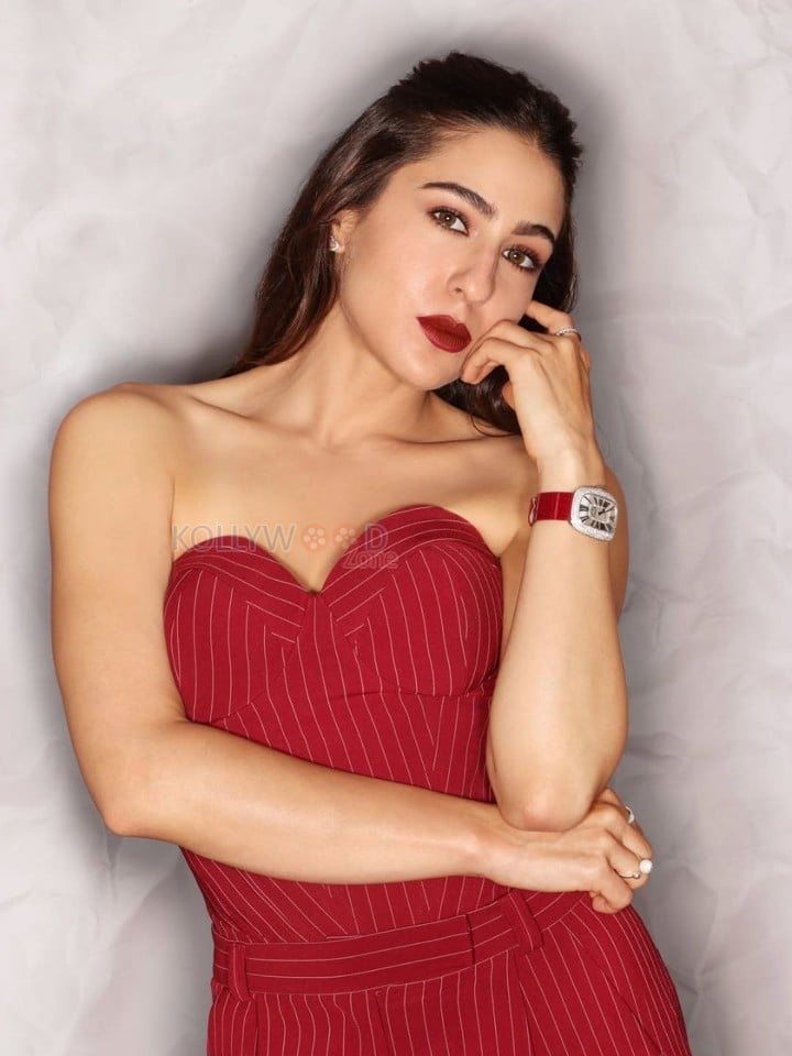 Luscious Sara Ali Khan in a Red Off Shoulder Jumpsuit Photos 02