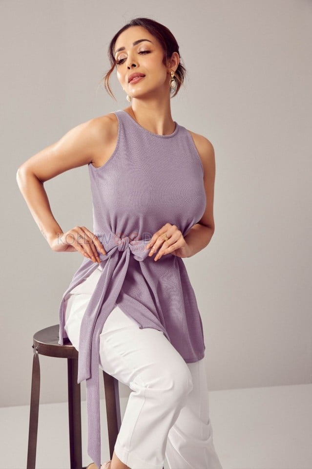 Malaika Arora in a Lilac Sleeveless Top with Belt Photo 01