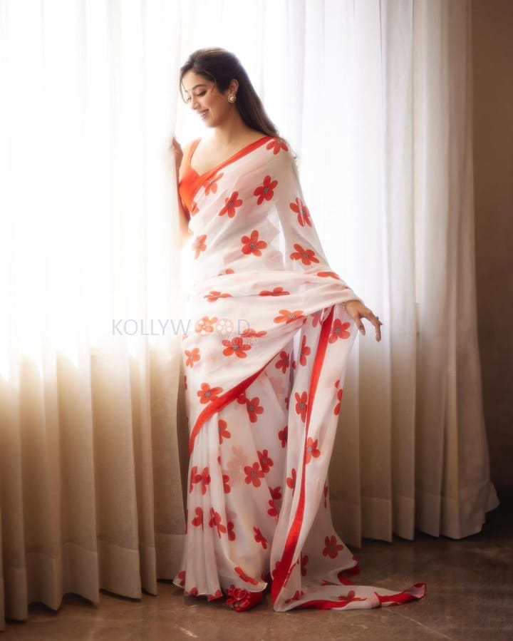 Mesmerizing Beauty Janhvi Kapoor in a White Red Floral Saree with Sleeveless Blouse Photos 05