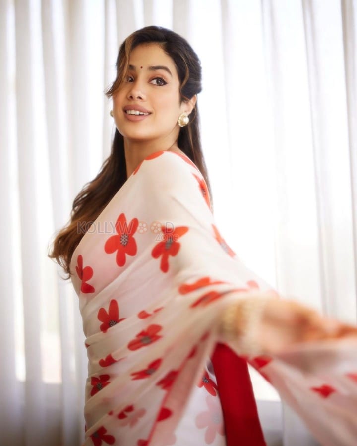 Mesmerizing Beauty Janhvi Kapoor in a White Red Floral Saree with Sleeveless Blouse Photos 06