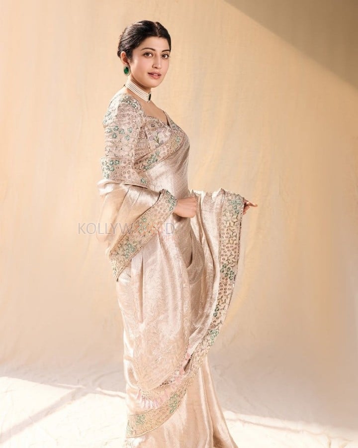 Mesmerizing Pranitha Subhash in a Cream Silk Saree with an Embroidered Blouse Photos 03