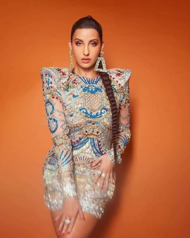 Nora Fatehi in an Embellished Falguni Shane Peacock Mini Dress Photos 01