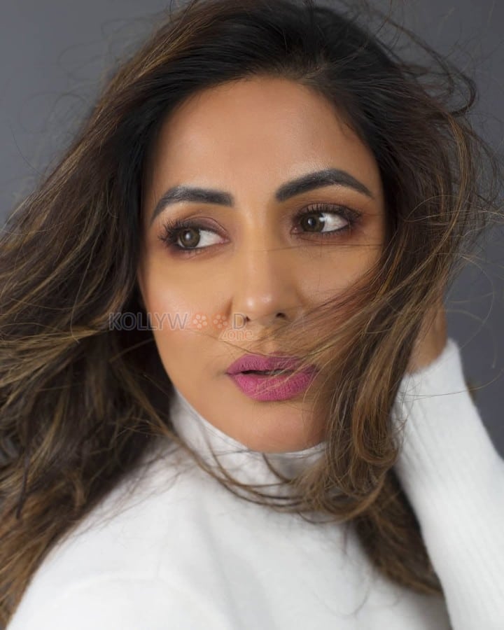 Pretty Hina Khan in a White High Neck Sweater Photos 01