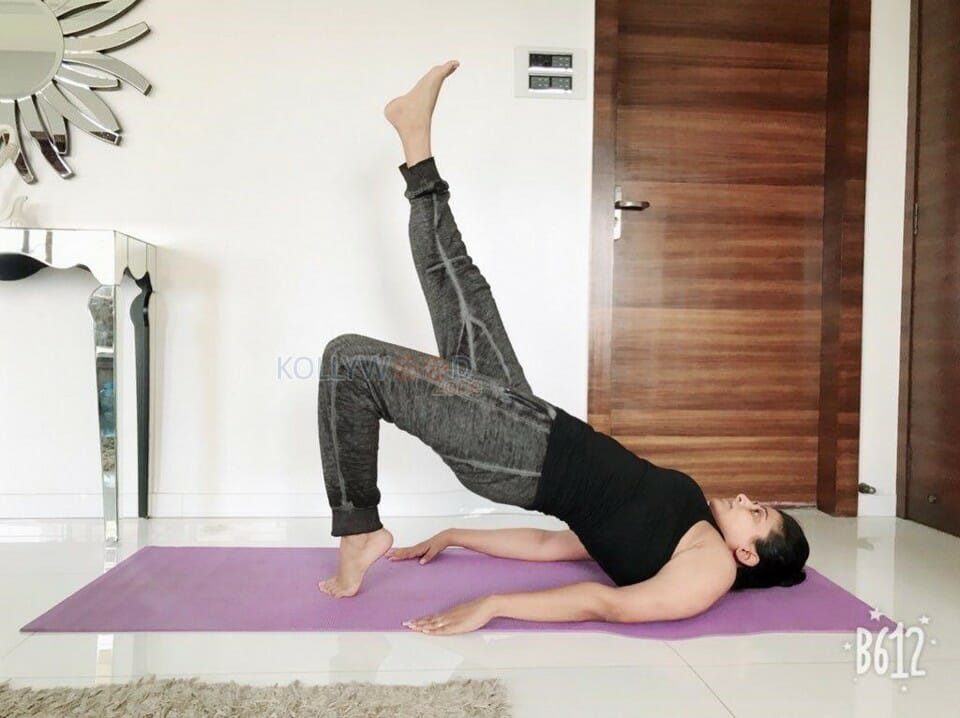 Priyamani Performing Yoga On International Yoga Day Photos