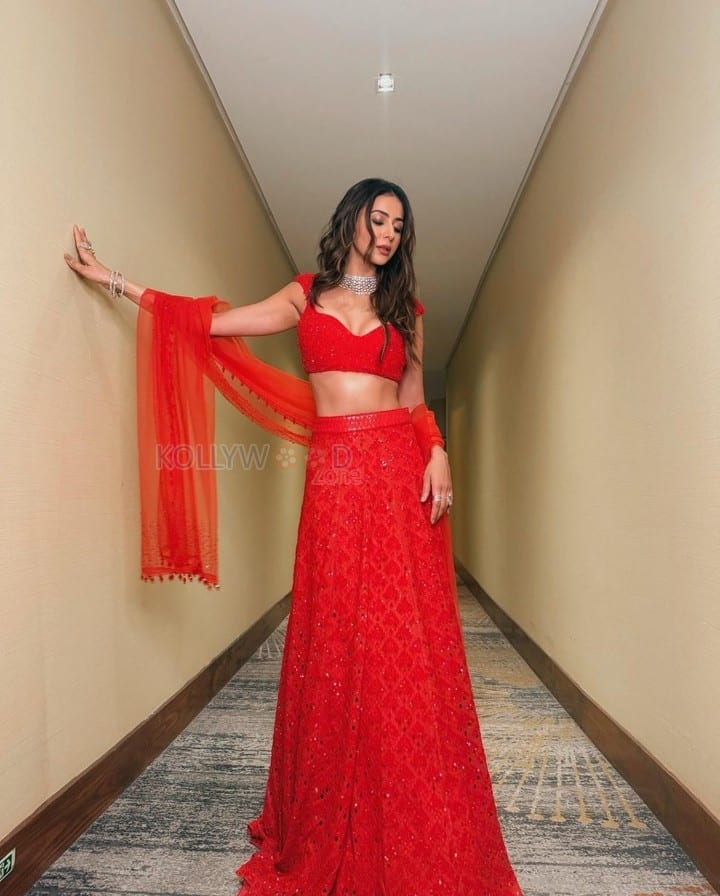 Ravishing Rakul Preet Singh in a Red Embroidered Lehenga Choli with 3D Blouse Photos 04