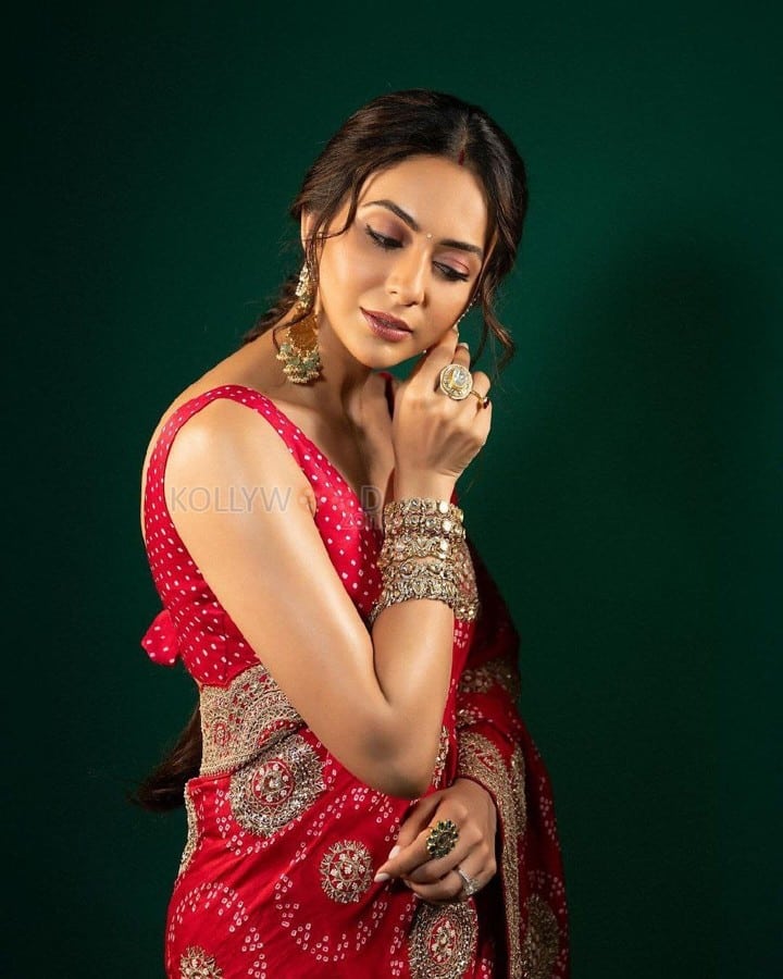 Ravishing Rakul Preet Singh in a Royal Red Saree with a Matching Sleeveless Blouse Pictures 02